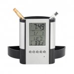 Relógio digital com porta caneta.