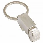 Chaveiro de metal brilhante, com formato de caminhão.