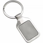 Chaveiro de metal com detalhe espelhado preto.