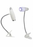 Luminária para leitura com clip.
