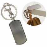 Porta Bolsa retangular de metal, com os cantos arredondados.